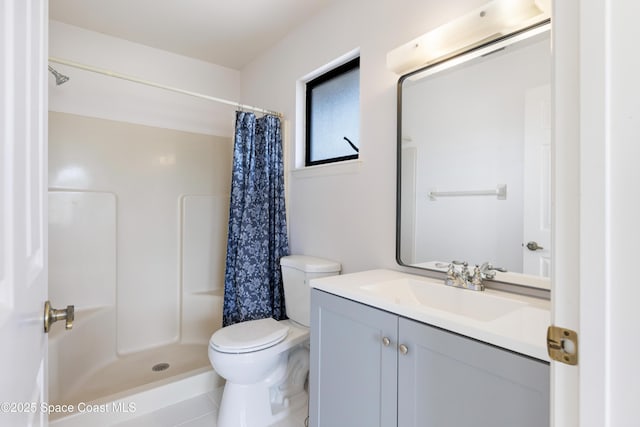 654 Centre Ct SW Unit 201, Vero Beach, FL 32962 - full bathroom featuring vanity, toilet, and a shower with curtain