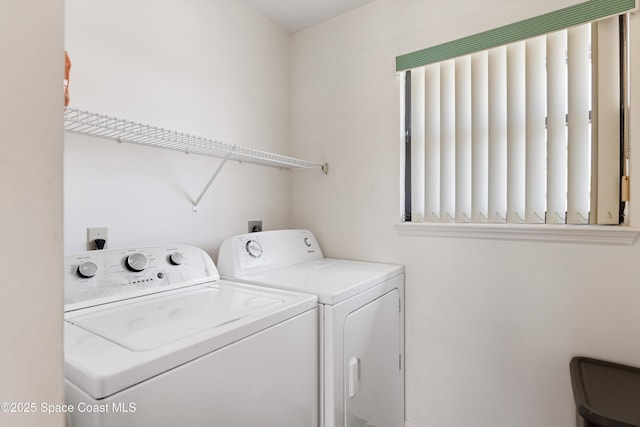 654 Centre Ct SW Unit 201, Vero Beach, FL 32962 - laundry area featuring separate washer and dryer