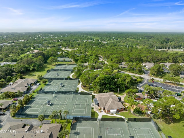 654 Centre Ct SW Unit 201, Vero Beach, FL 32962 - aerial view of property and surrounding area featuring a heavily wooded area and nearby suburban area