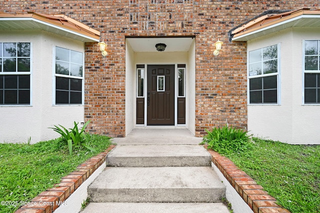 2575 Cox Rd, Cocoa, FL 32926 - property entrance featuring brick siding