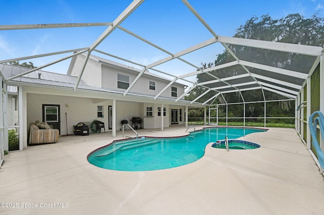 2575 Cox Rd, Cocoa, FL 32926 - view of pool with a patio, a pool with connected hot tub, and a lanai