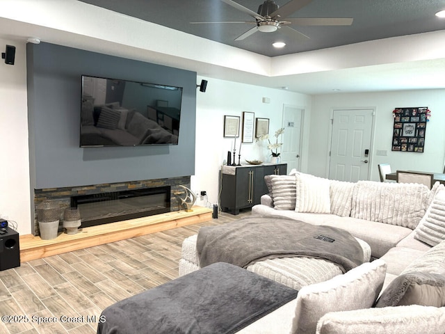 259 Wilton Ave SW, Palm Bay, FL 32908 - living area featuring ceiling fan, wood finished floors, recessed lighting, and a raised ceiling