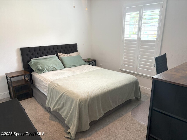 259 Wilton Ave SW, Palm Bay, FL 32908 - carpeted bedroom featuring baseboards