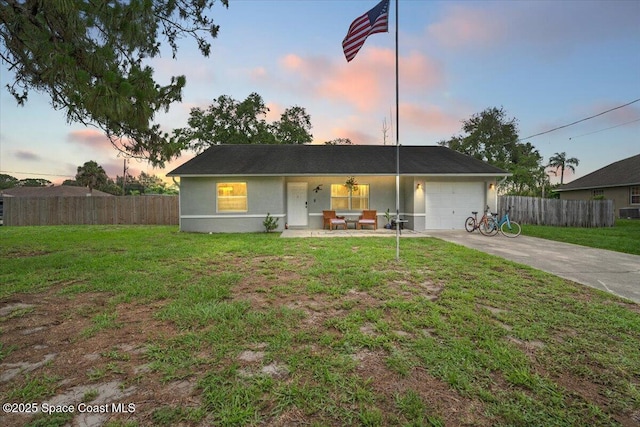 5997 Jenkins Ave, Cocoa, FL 32927 - single story home featuring driveway, a garage, covered porch, and stucco siding