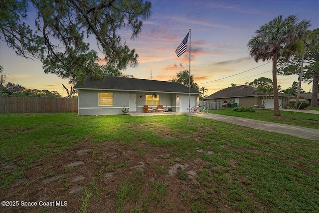 5997 Jenkins Ave, Cocoa, FL 32927 - single story home featuring concrete driveway, an attached garage, and stucco siding