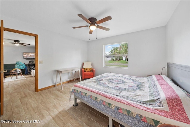 5997 Jenkins Ave, Cocoa, FL 32927 - bedroom with light wood-style floors and a ceiling fan