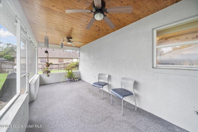 5997 Jenkins Ave, Cocoa, FL 32927 - unfurnished sunroom featuring ceiling fan and plenty of natural light