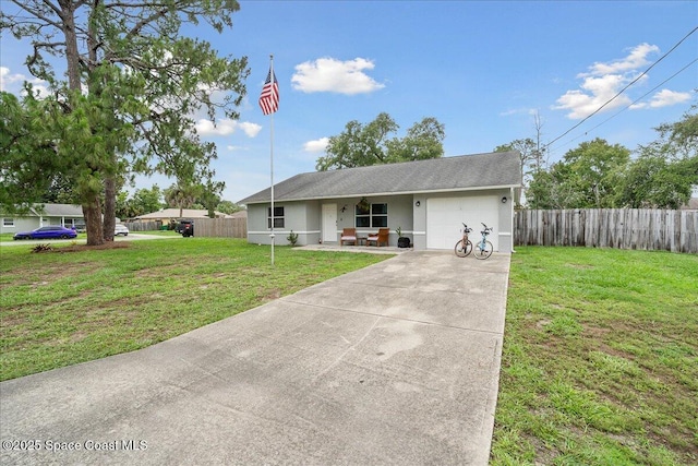 5997 Jenkins Ave, Cocoa, FL 32927 - single story home featuring a garage, driveway, and stucco siding