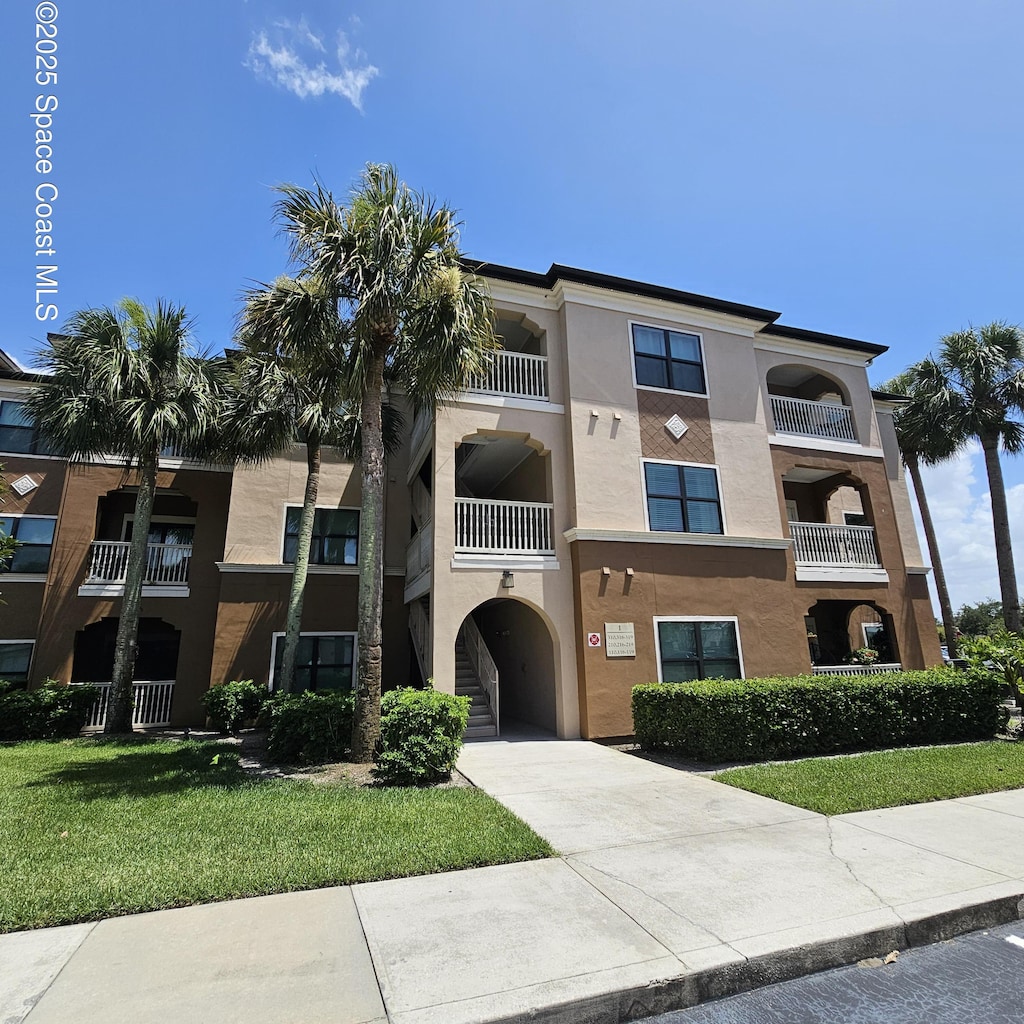 6411 Borasco Dr Unit 219, Melbourne, FL 32940 - view of property with driveway