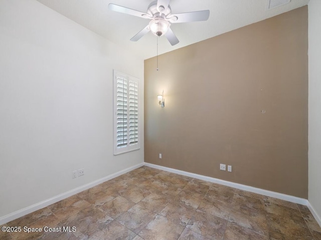5422 Barbados Sq, Vero Beach, FL 32967 - empty room with a ceiling fan and baseboards