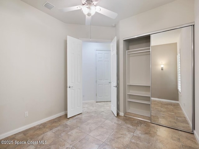 5422 Barbados Sq, Vero Beach, FL 32967 - unfurnished bedroom with a closet, baseboards, and ceiling fan