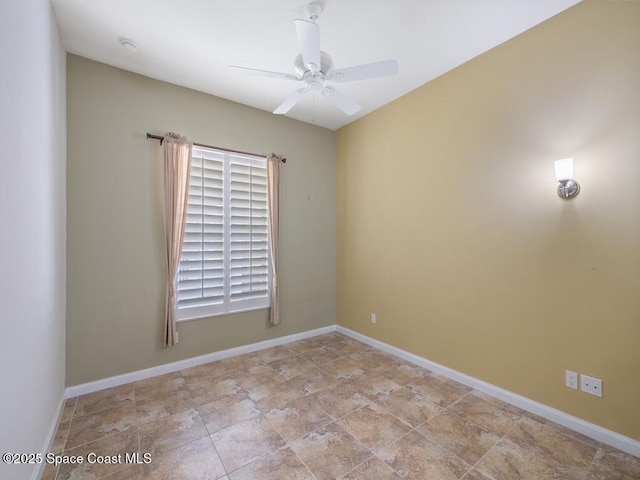 5422 Barbados Sq, Vero Beach, FL 32967 - empty room with a ceiling fan, a smoke detector, and baseboards