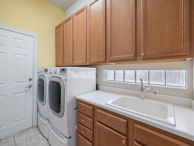 5422 Barbados Sq, Vero Beach, FL 32967 - laundry room featuring independent washer and dryer and cabinet space