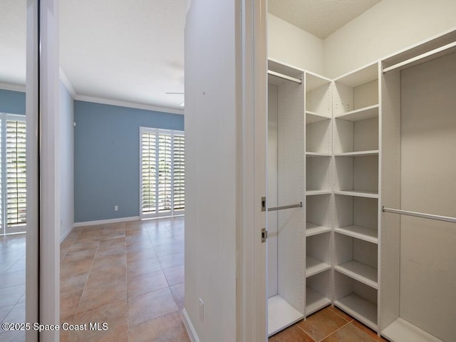 5422 Barbados Sq, Vero Beach, FL 32967 - spacious closet with tile patterned flooring