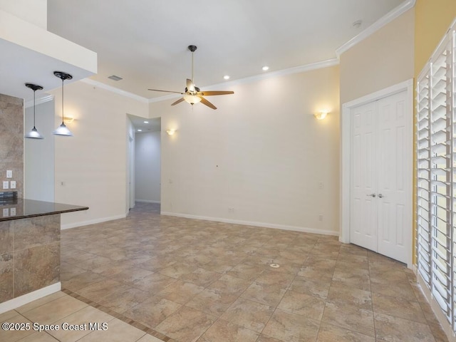 5422 Barbados Sq, Vero Beach, FL 32967 - unfurnished living room featuring crown molding, a ceiling fan, baseboards, and recessed lighting