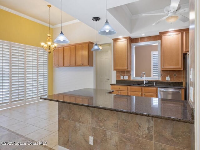 5422 Barbados Sq, Vero Beach, FL 32967 - kitchen featuring dishwasher, a sink, crown molding, tasteful backsplash, and a ceiling fan