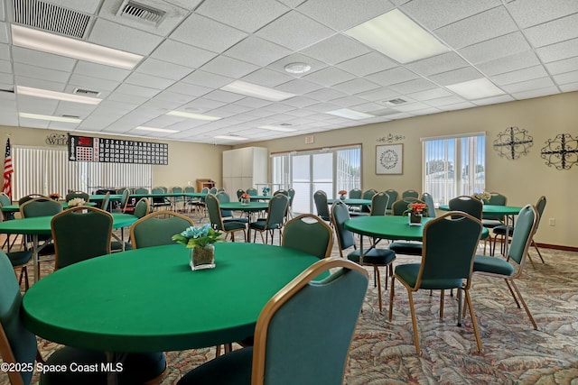1020 S Fork Cir, Melbourne, FL 32901 - carpeted dining room featuring a drop ceiling and baseboards