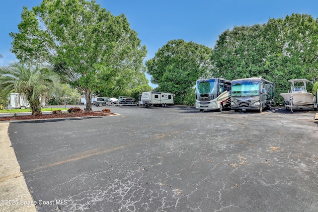 1020 S Fork Cir, Melbourne, FL 32901 - view of uncovered parking lot