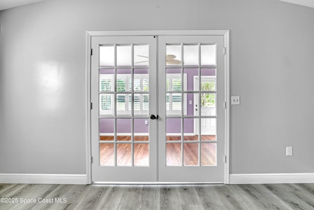1020 S Fork Cir, Melbourne, FL 32901 - doorway to outside with french doors and wood finished floors