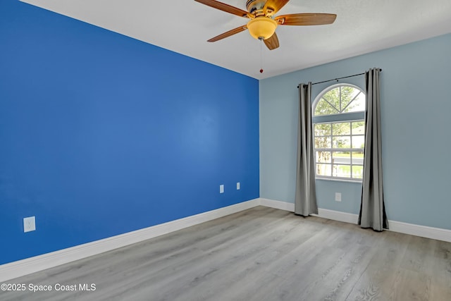 1020 S Fork Cir, Melbourne, FL 32901 - spare room featuring wood finished floors and a ceiling fan