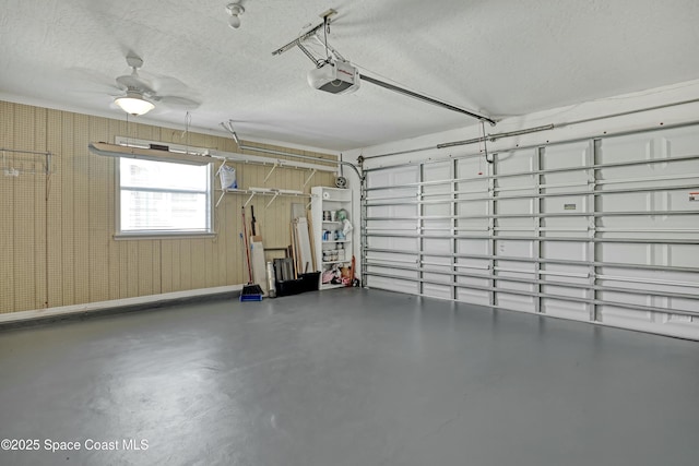 1020 S Fork Cir, Melbourne, FL 32901 - garage with a garage door opener and a ceiling fan
