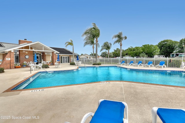 1020 S Fork Cir, Melbourne, FL 32901 - community pool with a patio