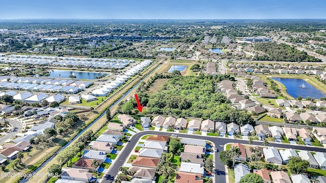 1020 S Fork Cir, Melbourne, FL 32901 - aerial view of property and surrounding area with a large body of water and nearby suburban area