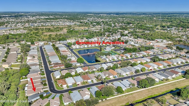 1020 S Fork Cir, Melbourne, FL 32901 - aerial view of property and surrounding area featuring nearby suburban area and a large body of water
