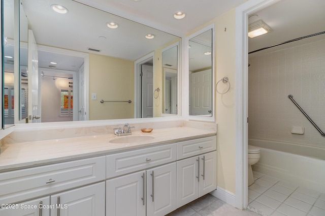 2260 Front St Unit 103, Melbourne, FL 32901 - bathroom featuring tile patterned flooring, vanity, toilet, bathtub / shower combination, and recessed lighting