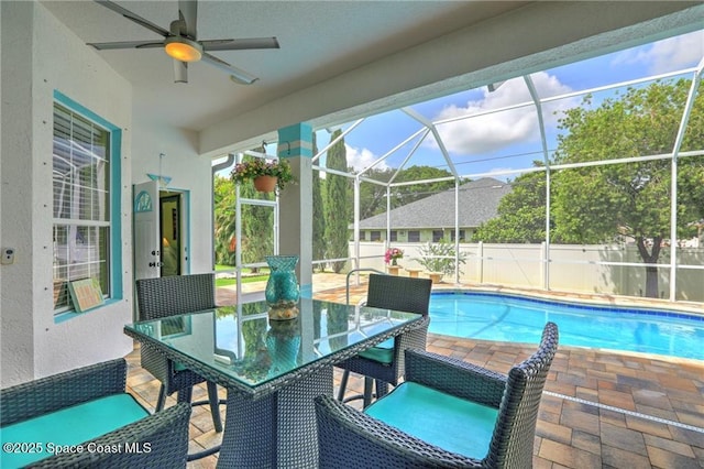1641 Galilean Ln, Sebastian, FL 32958 - view of swimming pool featuring a ceiling fan, a patio, a lanai, and outdoor dining area