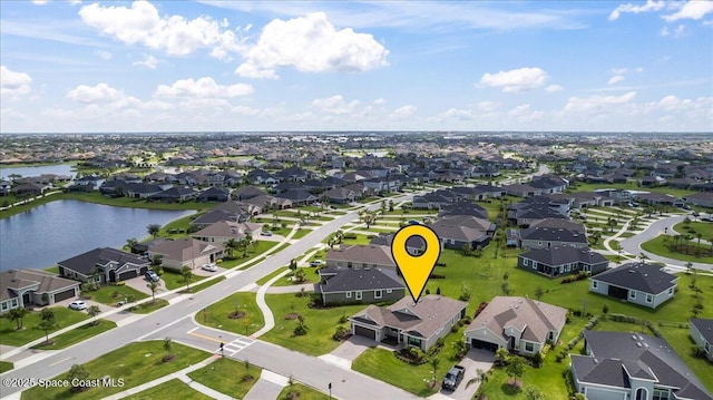 7917 Dobre Way, Melbourne, FL 32940 - aerial view of property and surrounding area with nearby suburban area and a large body of water