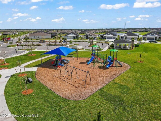 7917 Dobre Way, Melbourne, FL 32940 - communal playground featuring a residential view and a yard