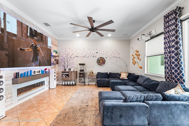 125 Rudy St, Auburndale, FL 33823 - living room with ceiling fan, light tile patterned floors, a glass covered fireplace, ornamental molding, and recessed lighting