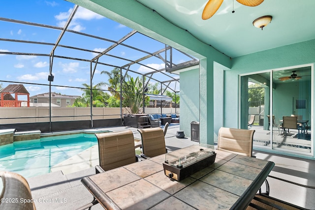 125 Rudy St, Auburndale, FL 33823 - view of patio featuring a ceiling fan, outdoor dining space, a lanai, and a hot tub