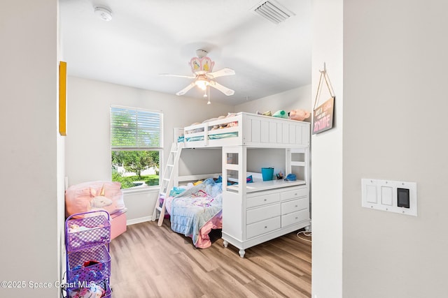 125 Rudy St, Auburndale, FL 33823 - bedroom featuring wood finished floors and ceiling fan