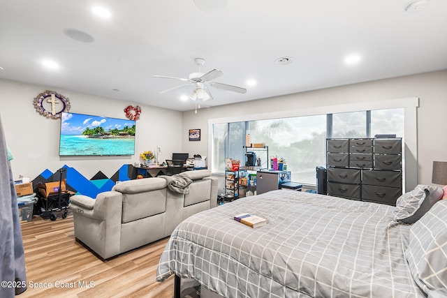 125 Rudy St, Auburndale, FL 33823 - bedroom with wood finished floors, recessed lighting, a ceiling fan, and a desk