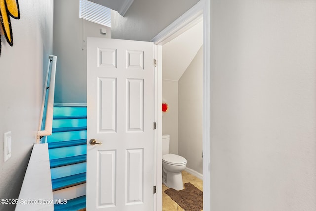 125 Rudy St, Auburndale, FL 33823 - bathroom featuring toilet and tile patterned flooring