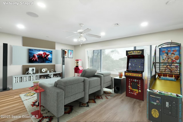 125 Rudy St, Auburndale, FL 33823 - living room with wood finished floors, ceiling fan, and recessed lighting