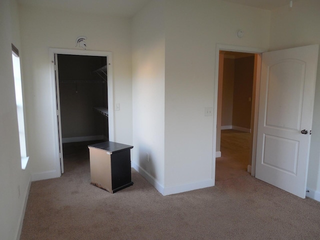 6460 Borasco Dr Unit 2903, Melbourne, FL 32940 - unfurnished bedroom with a spacious closet, light colored carpet, and a closet