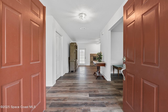 3435 Felda St, Cocoa, FL 32926 - entrance foyer with baseboards, dark wood-style flooring, and ceiling fan