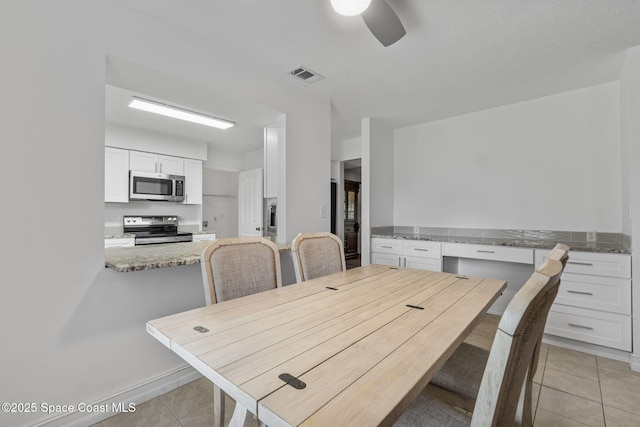 3435 Felda St, Cocoa, FL 32926 - dining space featuring light tile patterned floors and ceiling fan
