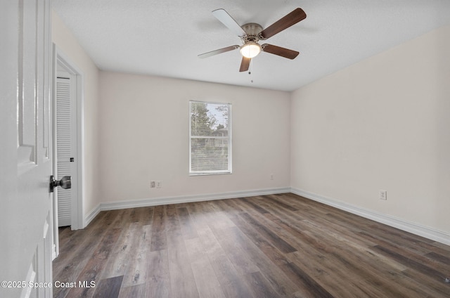 3435 Felda St, Cocoa, FL 32926 - unfurnished bedroom with wood finished floors, baseboards, and a ceiling fan