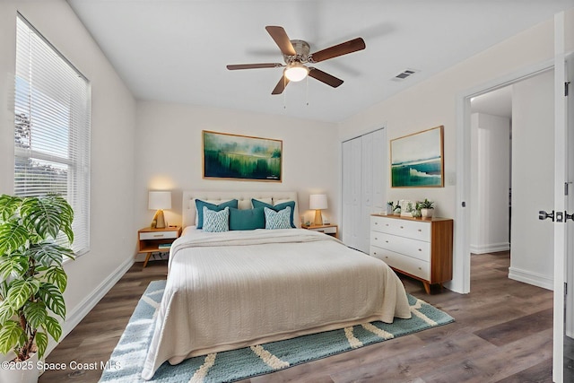 3435 Felda St, Cocoa, FL 32926 - bedroom with wood finished floors, baseboards, a closet, and ceiling fan