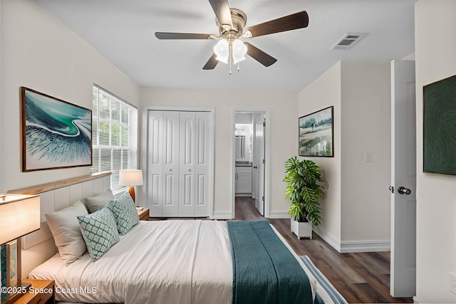 3435 Felda St, Cocoa, FL 32926 - bedroom with wood finished floors, baseboards, a closet, ceiling fan, and ensuite bath
