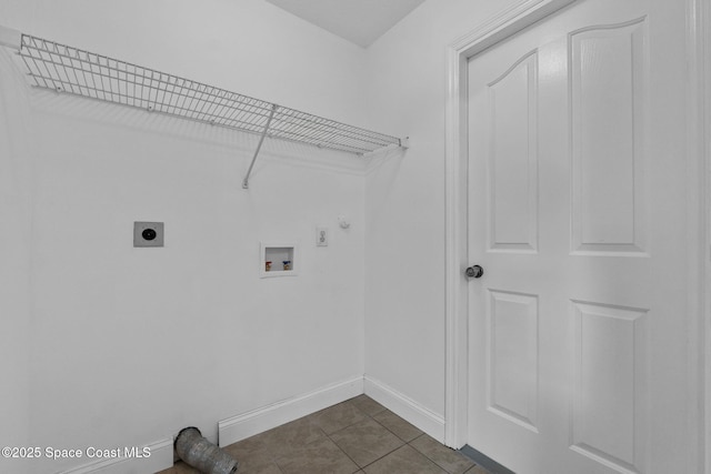 3435 Felda St, Cocoa, FL 32926 - washroom featuring electric dryer hookup, hookup for a washing machine, baseboards, dark tile patterned floors, and hookup for a gas dryer