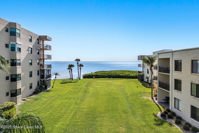 200 International Dr Unit 817, Cape Canaveral, FL 32920 - view of yard with a water view and central AC unit