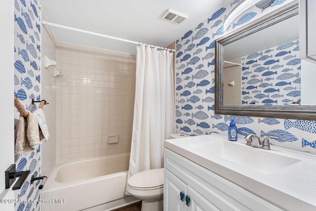 200 International Dr Unit 817, Cape Canaveral, FL 32920 - bathroom featuring shower / tub combo, vanity, and toilet