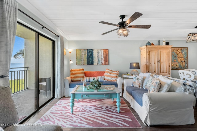 200 International Dr Unit 817, Cape Canaveral, FL 32920 - living area featuring wood finished floors, a ceiling fan, and crown molding