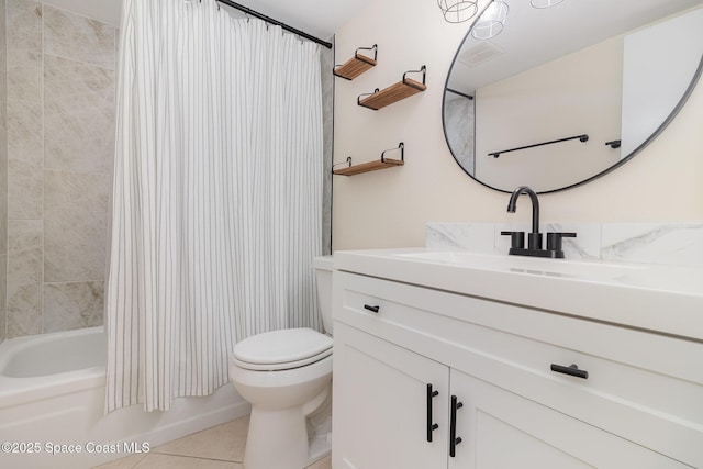 1935 Conway Rd Unit A4, Orlando, FL 32812 - full bath with vanity, toilet, shower / tub combo with curtain, and tile patterned floors