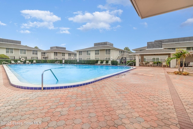 1935 Conway Rd Unit A4, Orlando, FL 32812 - community pool with a patio area